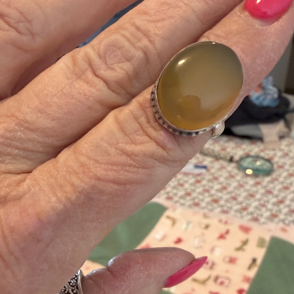 Elegant Sterling Silver and Gold stone Ring